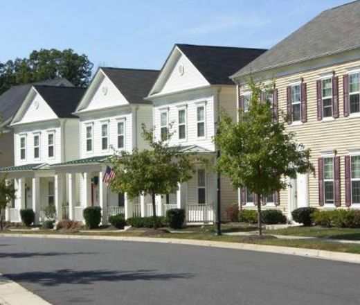 a row of new homes along a street