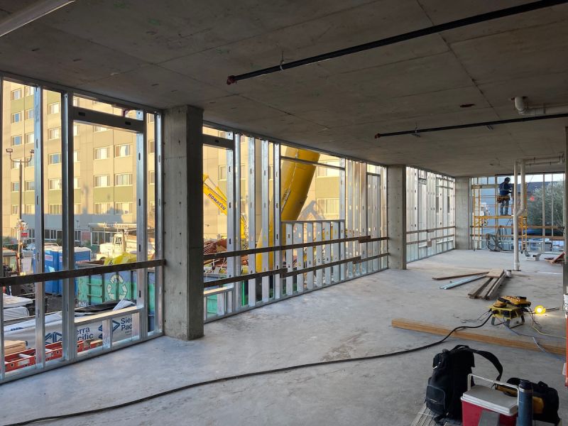 Construction Worker Framing Early Learning Center Space