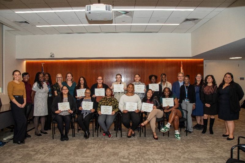 Housing Career Pathways trainees from Cohort Seven celebrate graduation with program partners.
