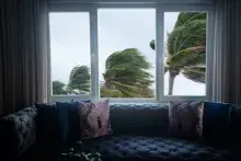Photo of Living Room with Storm Brewing Outside