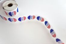 Roll of voting stickers with a white background