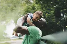 Father holding baby