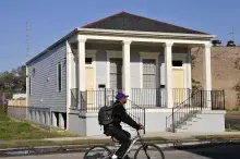 home with bike rider