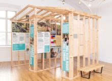 An exhibit modeled after a home under construction with displays