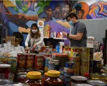 Man and woman helping with community COVID response