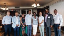 Enterprise team and the USVI Housing Ecosystem Development grantees stand together