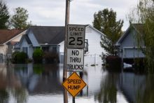 Flooded street with signs