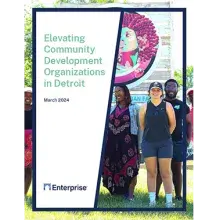 Elevating Community Development Organizations in Detroit and a group of people standing in front of a mural