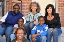 Group of residents on front steps