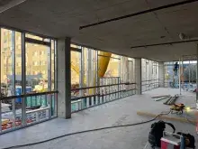 Construction Worker Framing Early Learning Center Space
