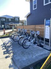 Bikes parked at a bike rack at one of the Arcata Housing apartments 
