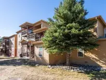 Ground view Eagle Villas, a 3-story apartment building in Eagle, Colorado