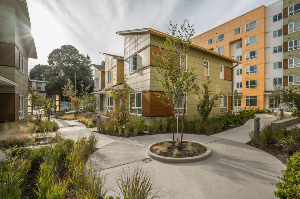 A courtyard of an affordable housing complex