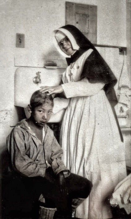 A nun with a student in an Indian boarding school