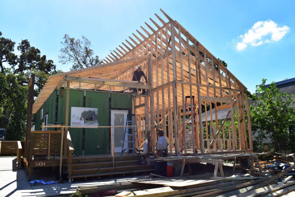 House being constructed, in framing stages