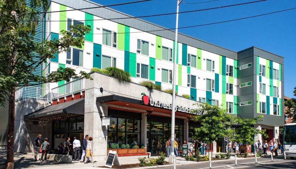 A colorfully designed building, a project of the Affordable Housing Design Leadership Institute