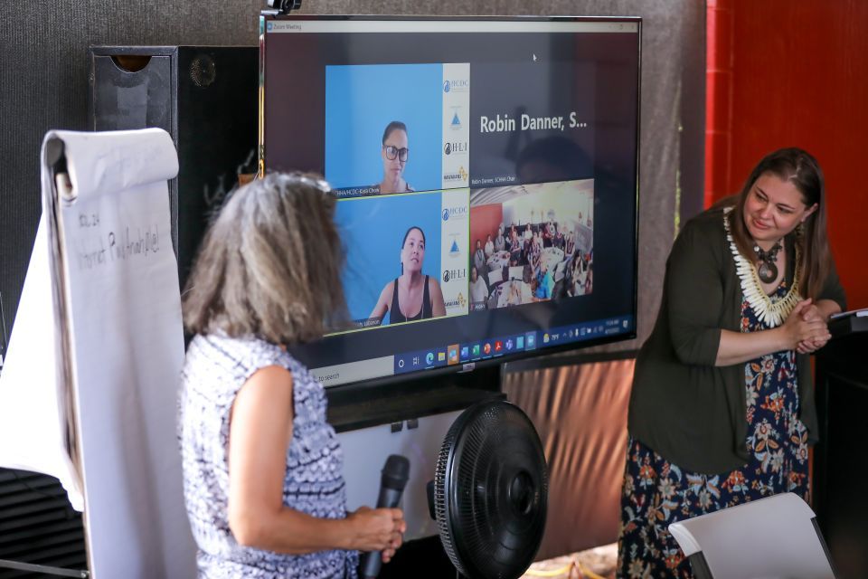 two women giving a presentation