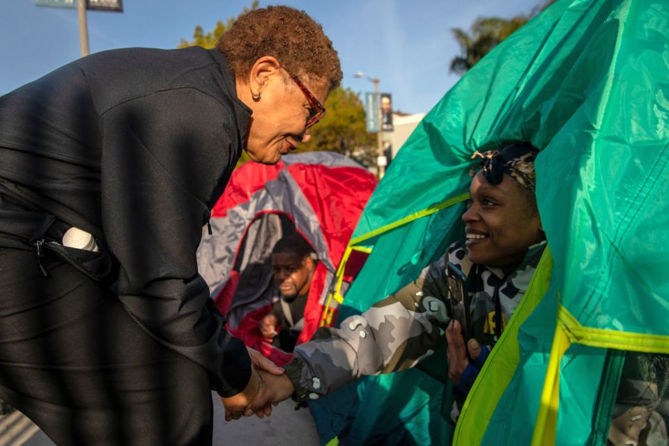 Los Angeles Mayor Karen Bass speaking with homeless individual