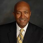 Headshot of Rev. Dr. Joaquin Willis, President and CEO, Collective Empowerment Group of South Florida