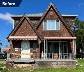 A home with broken and missing front steps in Detroit. 