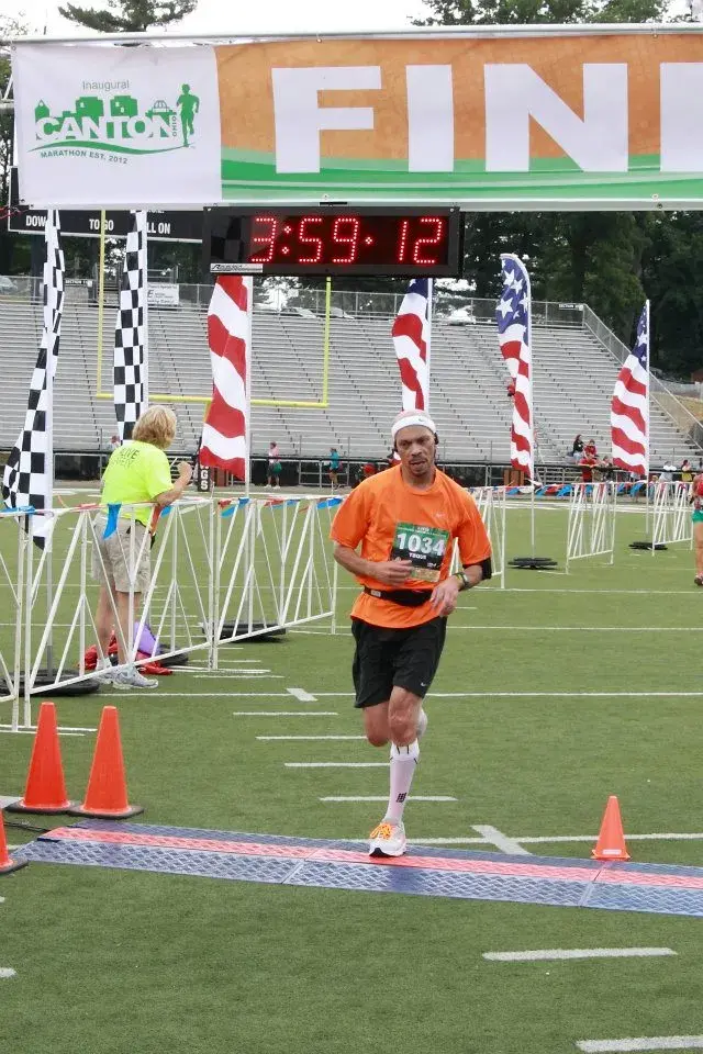 Tim Block finishing a marathon