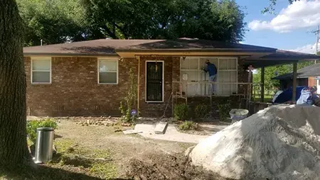 A home that had been damaged by the floods from Hurricane Katrina being repaired
