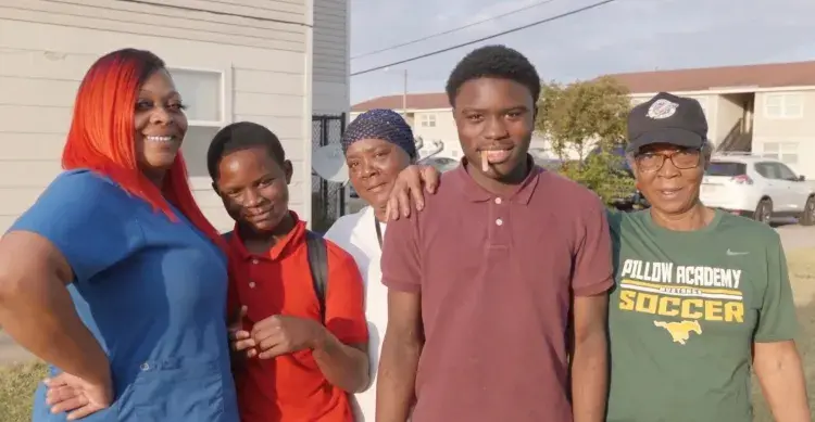 Smiling family in their neighborhood