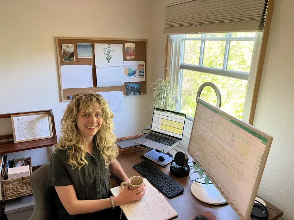 Claire Parisa at her desk