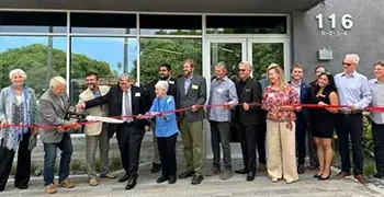 A group of people at the Vera Cruz Village ribbon cutting in Santa Barbara