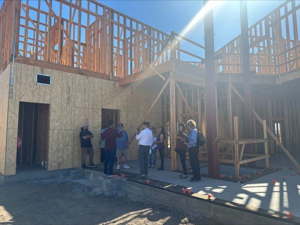 People touring building of Escalante Meadows