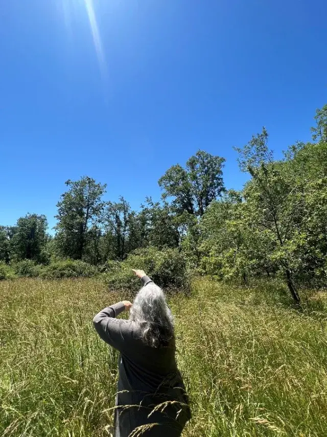 Woman in a field on Northern CA tribal lands