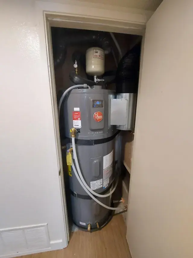 Electric hot water heater in closet