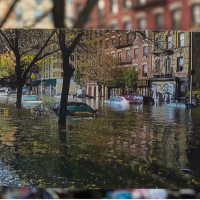 Photo of postcard and background of flooded street