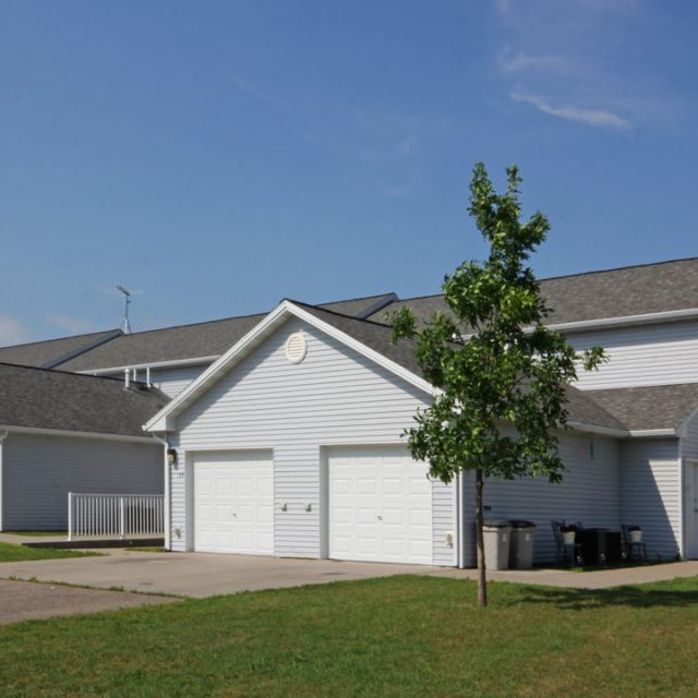 A photo of two homes sitting side by side