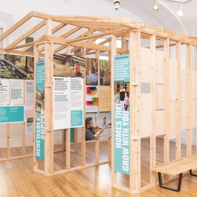 An exhibit modeled after a home under construction with displays