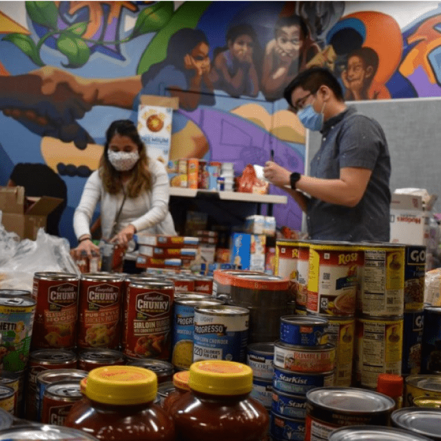 Man and woman helping with community COVID response