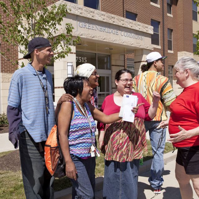 Group of people standing outside Greenbridge Commons