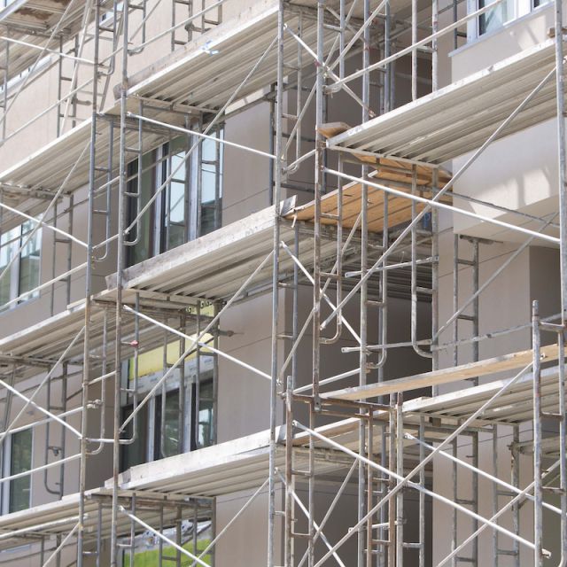 Building under construction with scaffolding