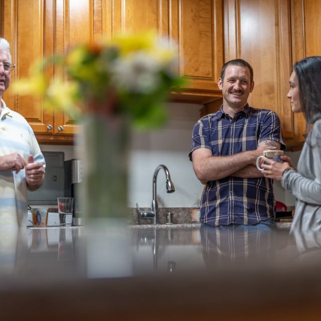 Homecoming Project family in the kitchen