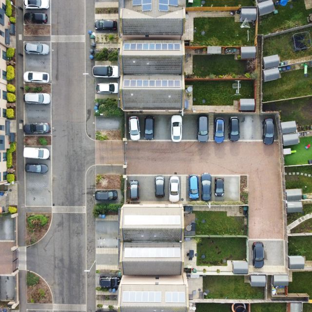 Aerial view of community with solar panels