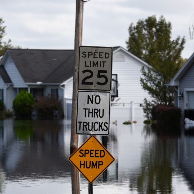 Flooded street with signs