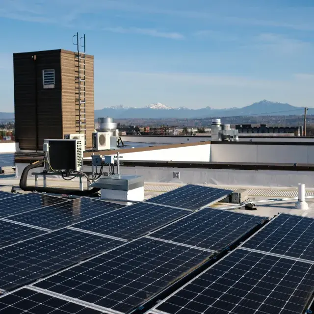 Solar panels installed on the rooftop of HopeWorks Station North building