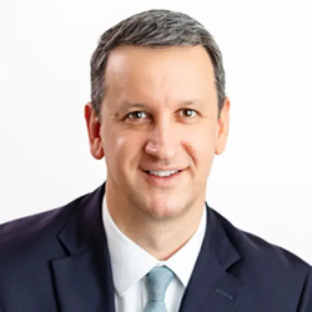 Allan Bach, director, investor relations, headshot