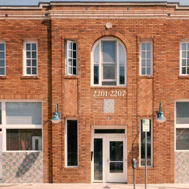 Two-story red brick building 