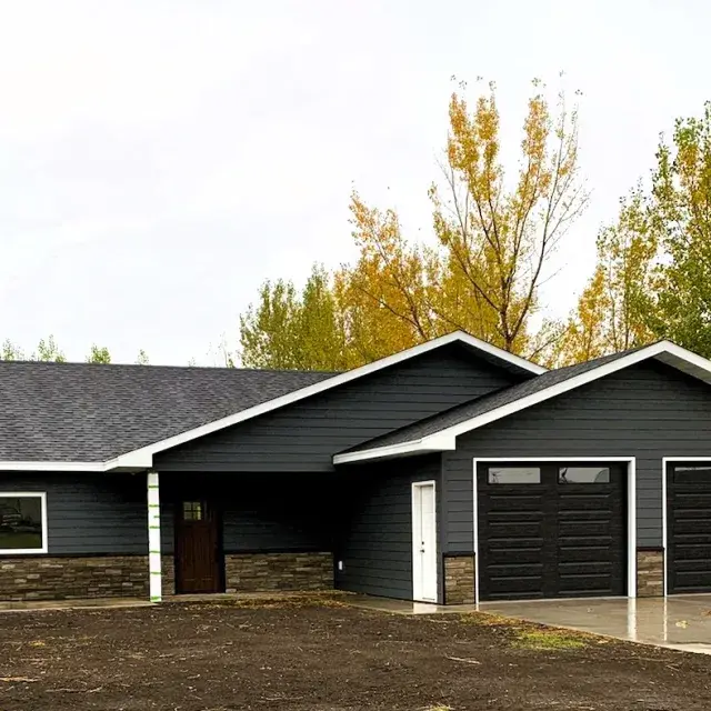 Grayish single-story, family home under construction