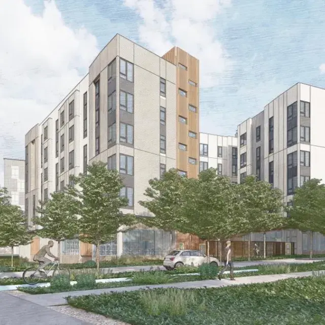 Rendering of an apartment building across the street from a transit stop with people riding bikes and walking in the neighborhood