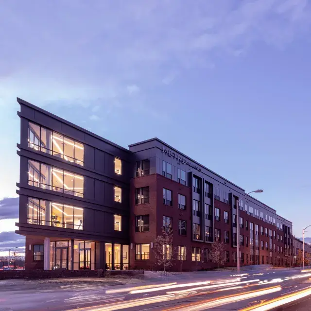 Streetview of the Metro Heights Apartments, a 4-story building at a street corner