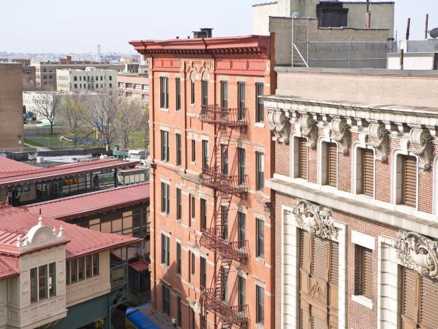 Apartment building and shop in New York City