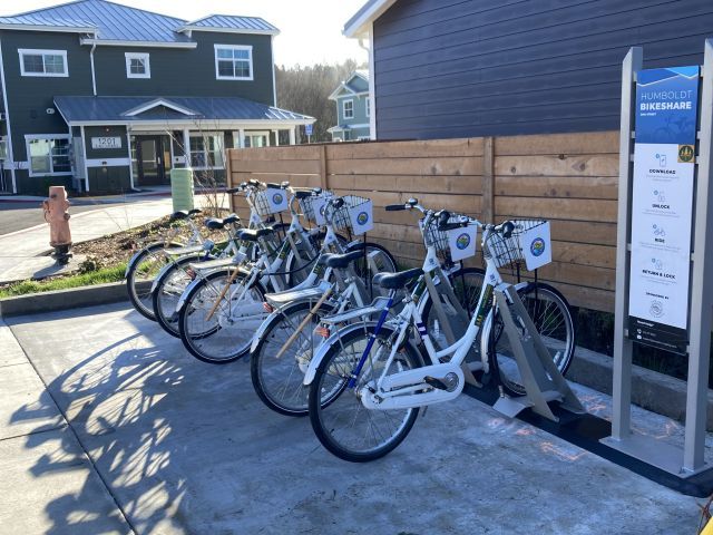 Bikes parked at a bike rack at one of the Arcata Housing apartments 