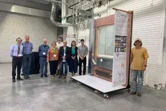 A team of people posing for a picture